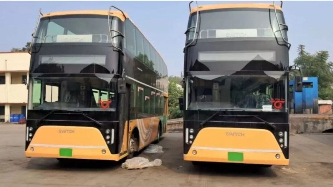Noida transport, double decker buses, electric buses, Noida public transport, sustainable mobility, green transport India, Noida electric vehicles, Morna Depot buses, Pari Chowk commute, EV buses India, clean energy transport, urban mobility Noida
