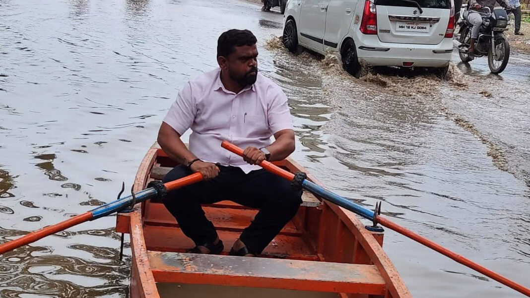 Pune Resident Uses Boat To Highlight Drainage Chaos