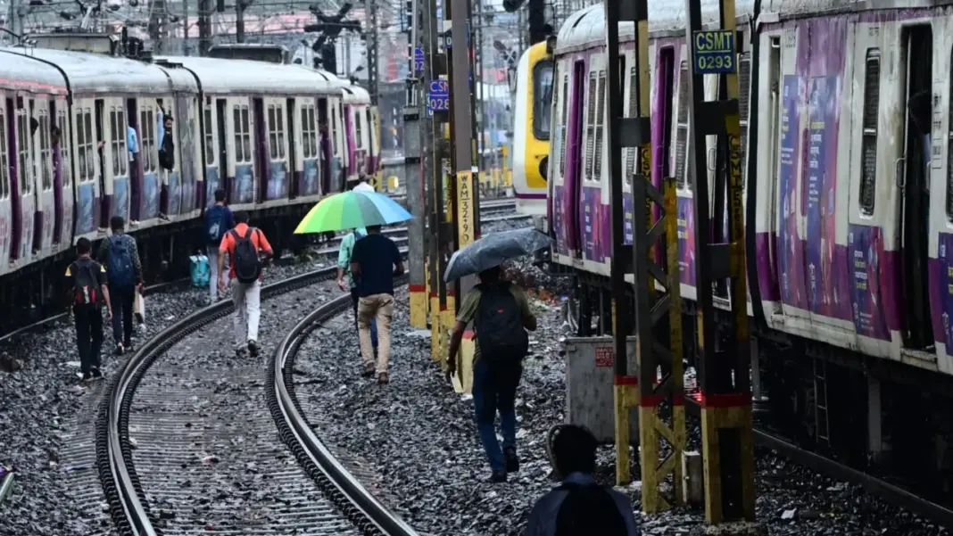Mumbai Local Trains Delayed by Rain and Snags