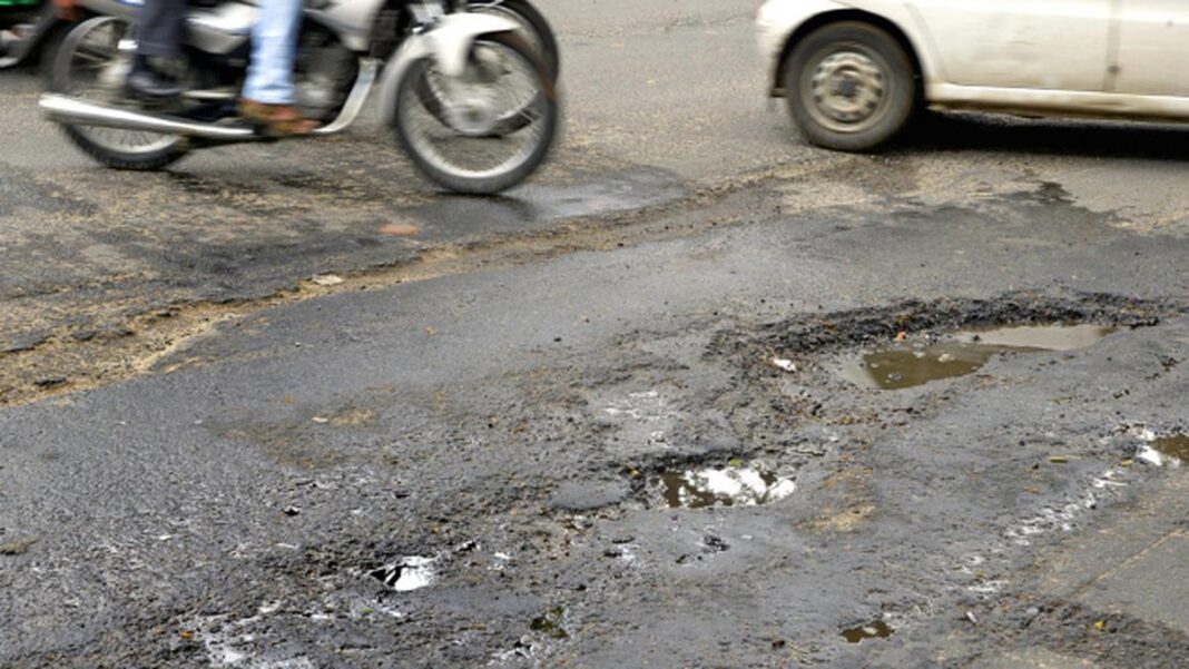 Hyderabads Hospital Road Turns Dangerous with Monsoon Potholes