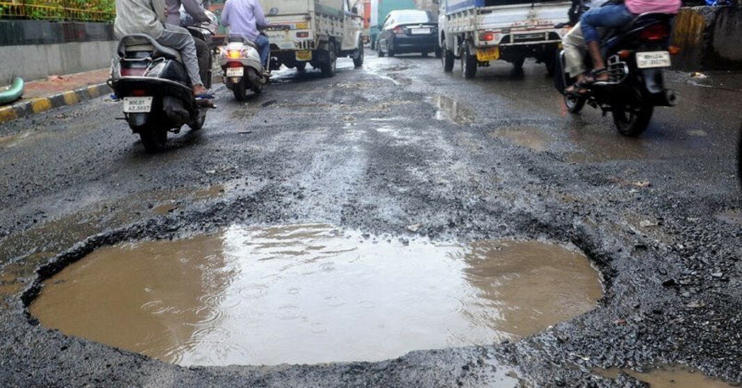 Noida commuters battle monsoon-hit roads and rising pothole dangers daily