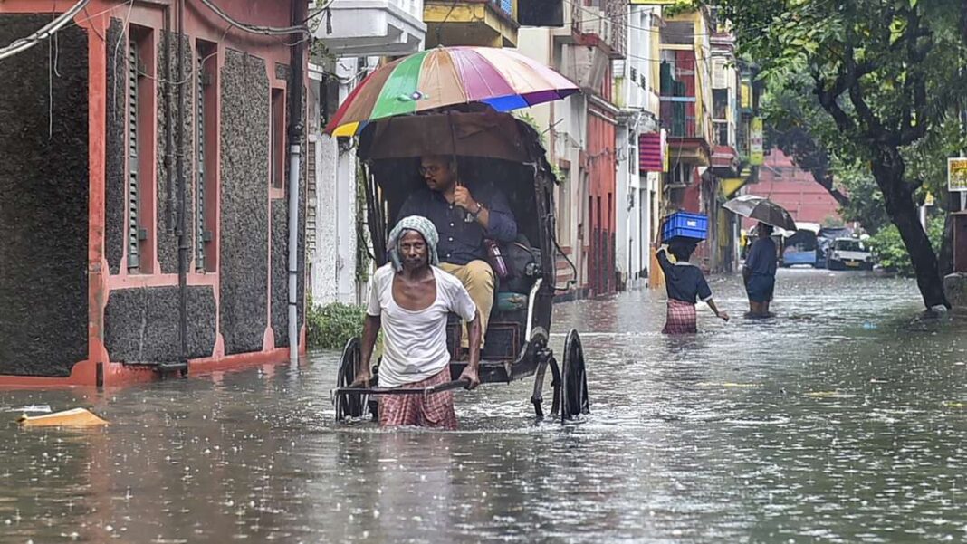 Kolkata streets flood after heavy rain as silted drains paralyse traffic in key areas