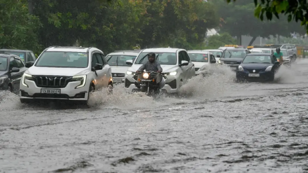 Delhi NCR Experiences Heavy Rain Causing Flooding And IMD Red Alert