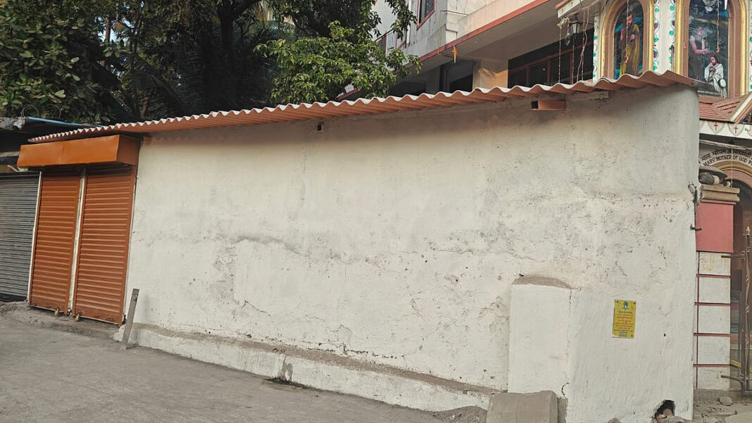 Andheri East Residents Raise Alarm Over Illegal Construction Enclosing Century Old Public Cross