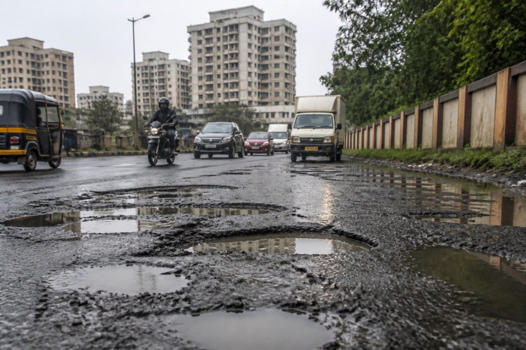 Pothole-filled road in Vasai-Virar awaiting repairs before the Dahi Handi festival
