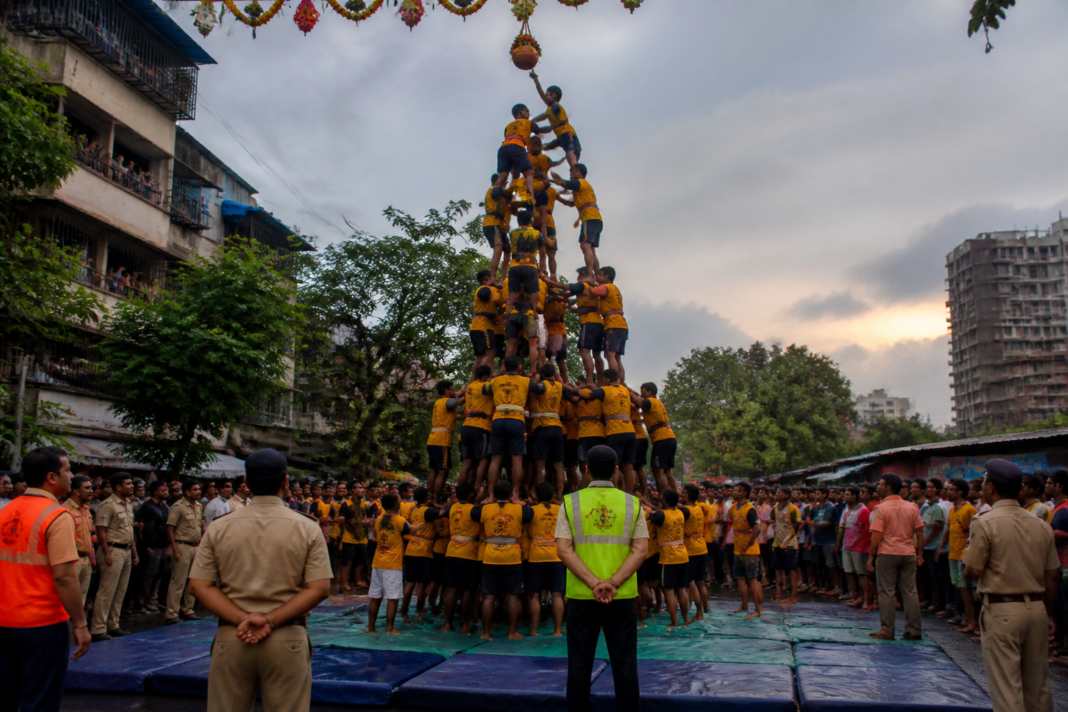 Dahihandi human pyramid during a Maharashtra festival, illustrating the public safety risks associated with a serious Dahihandi injury