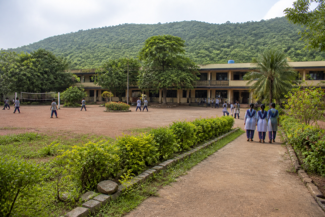 Government ashram school building in Thane division linked to teacher recruitment and document verification for 424 candidates