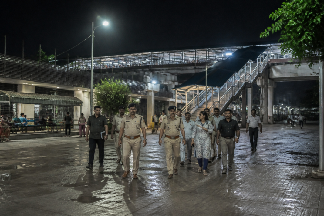 Nerul railway station in Navi Mumbai at night with police and civic officials inspecting the surrounding public space