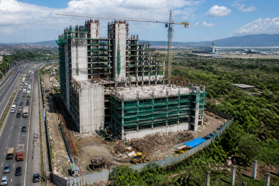Construction site of the Panvel Municipal Corporation headquarters near Panvel, highlighting the delayed Swarajya civic building project