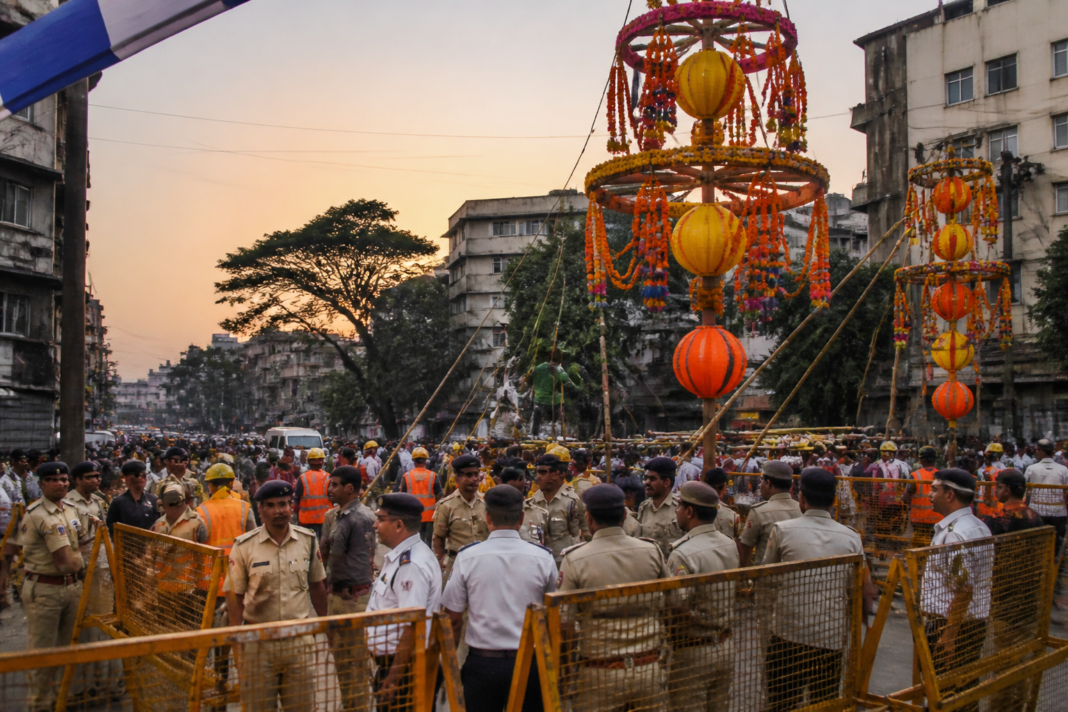 Dahihandi celebration preparations at a busy junction in Vasai-Virar with decorated structures and municipal safety arrangements
