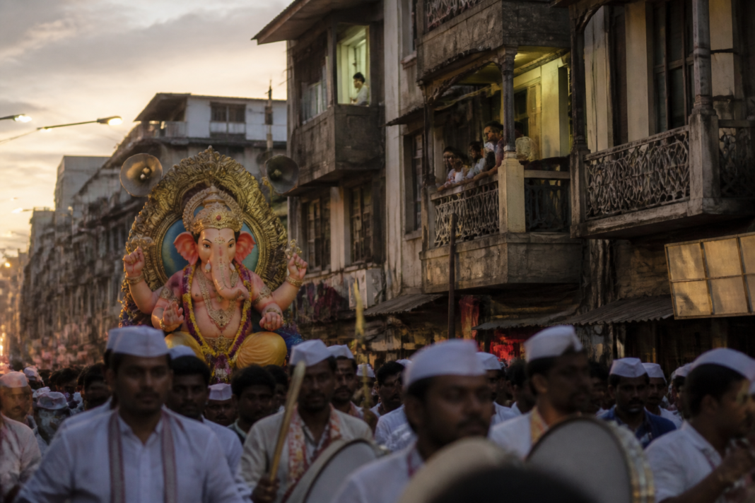 Ganeshotsav procession with drums and loudspeakers on a Pune street during the sound pollution debate