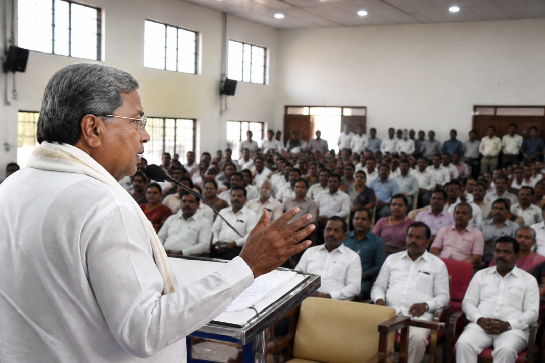Karnataka Deputy Chief Minister G. Parameshwara speaking at a public programme in Tumakuru about the Old Pension Scheme