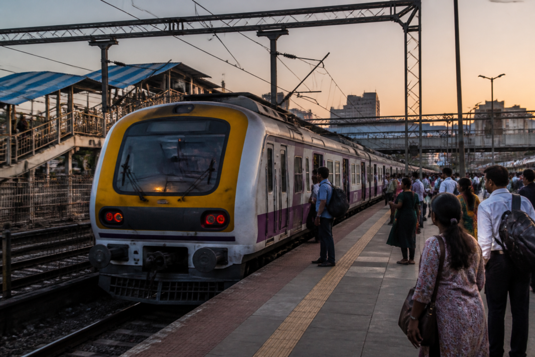 Western Railway passenger train at a Mumbai station for the Bandra Palitana special train service