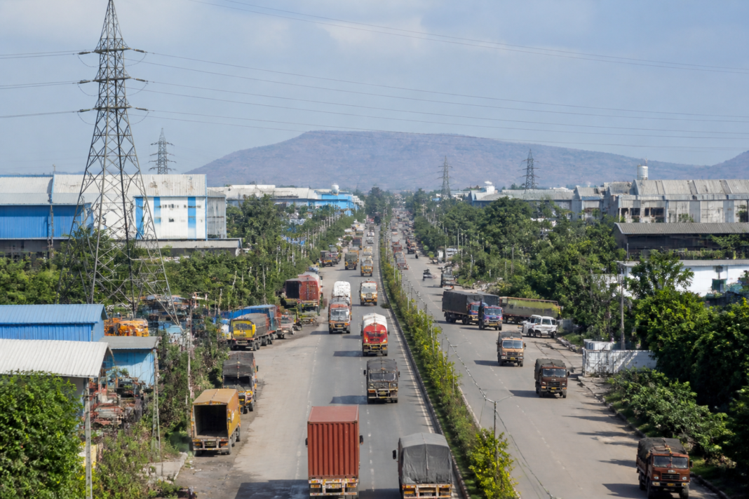 Industrial units and congested roads in the Chakan MIDC industrial area near Pune