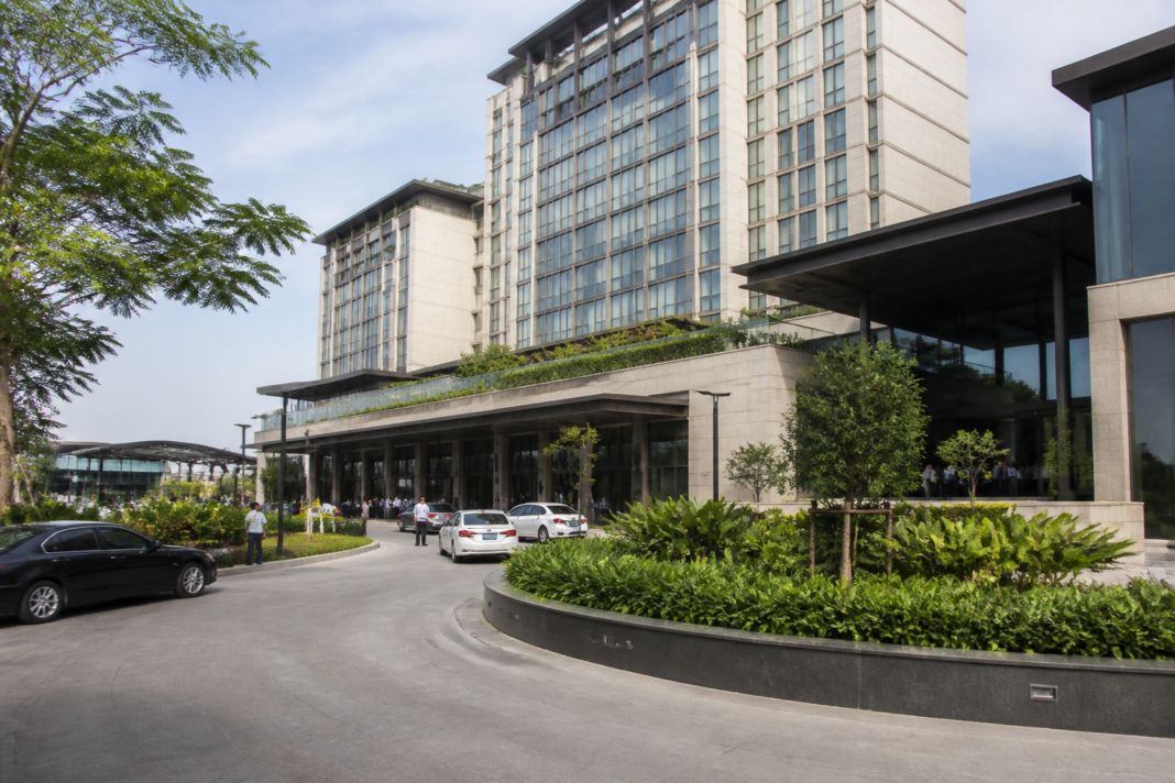 Chalet Hotels hospitality and commercial development expansion represented by a modern hotel complex in an urban setting