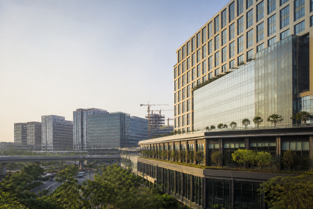 Urban hotel development representing Chalet Hotels expansion across India’s hospitality and commercial real estate markets