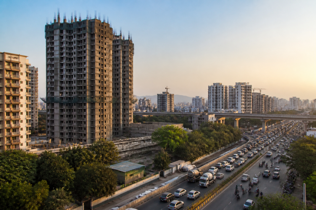 High-rise construction and urban roads in Pune illustrating the city's FSI and infrastructure capacity debate