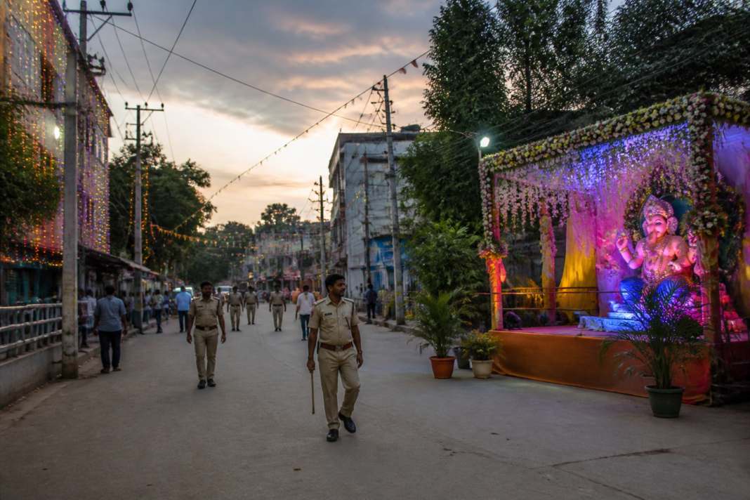 Ganeshotsav decorations and a public road in Hosadurga under local police safety and permission rules
