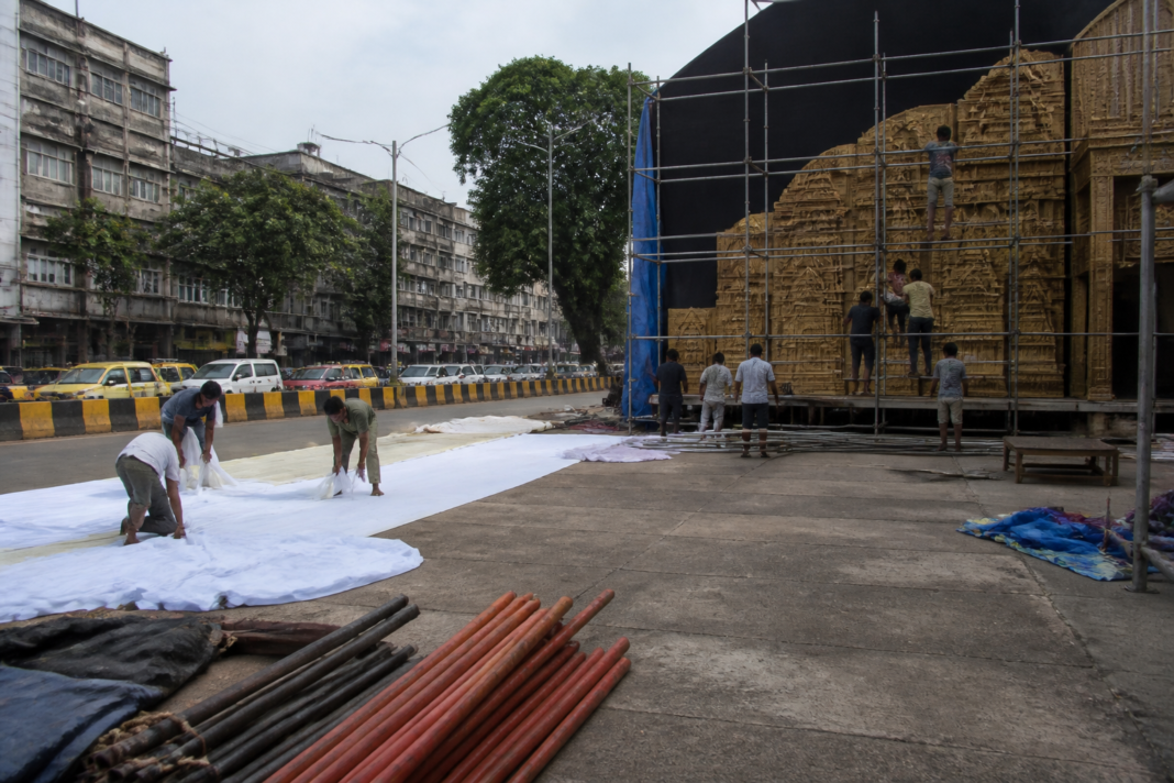 Mumbai Ganesh mandal workers preparing a festival pandal amid preparations for Ganesh Chaturthi 2026