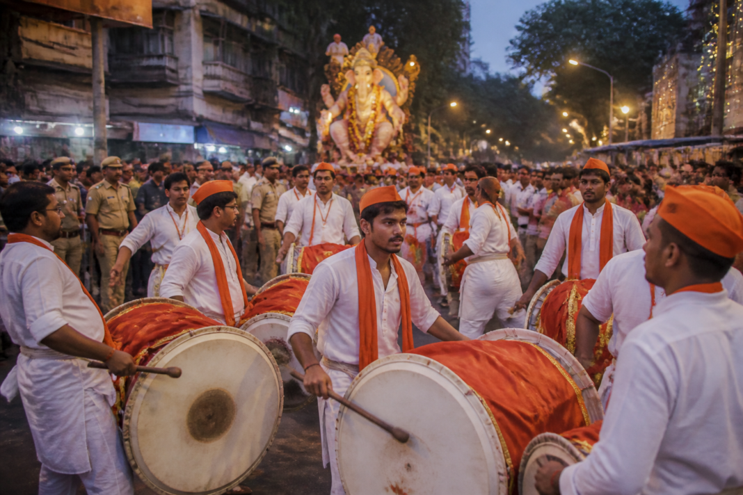 Ganeshotsav procession equipment and traditional drum-and-tasha performers in Pune amid restrictions on DJs and loud sound systems