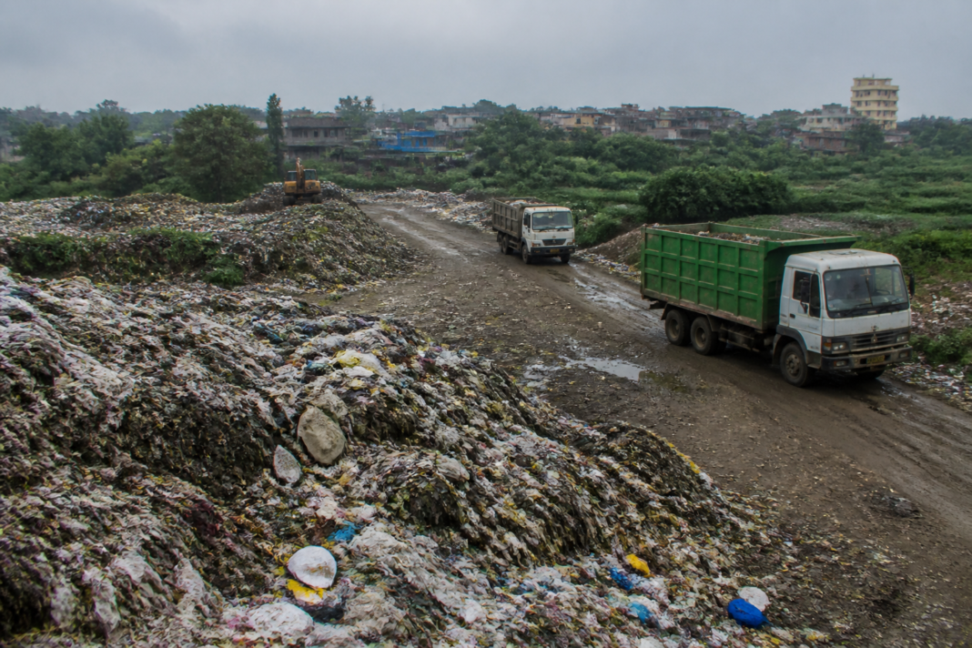 Waste heaps and municipal access roads at the Morekuran waste dump in Palghar