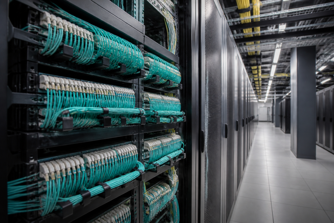 Optical fibre cables and network equipment in a digital infrastructure facility, representing STL’s revenue target and India’s data-centre expansion