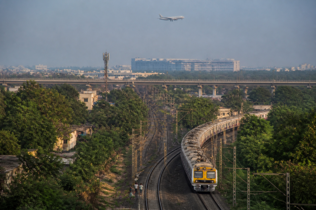 Railway tracks and suburban trains representing the proposed Panvel-Vasai railway corridor and Mumbai regional connectivity