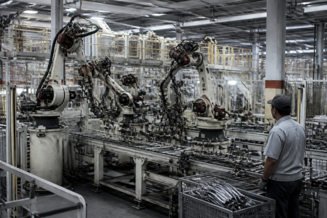 Automated manufacturing line inside a Chinese factory, illustrating the China factory jobs crisis and changing industrial employment