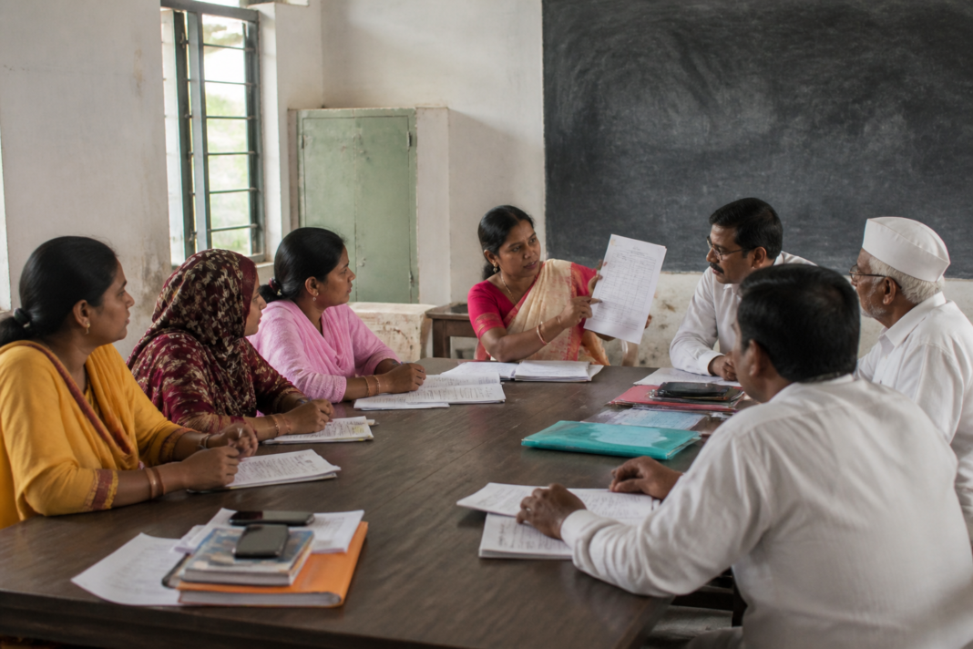 School management committee members attending a training session at a Maharashtra school