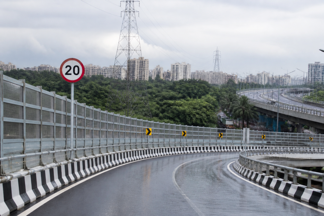 Mrunal Tai Gore flyover in Goregaon with road-safety signage and curved elevated roadway