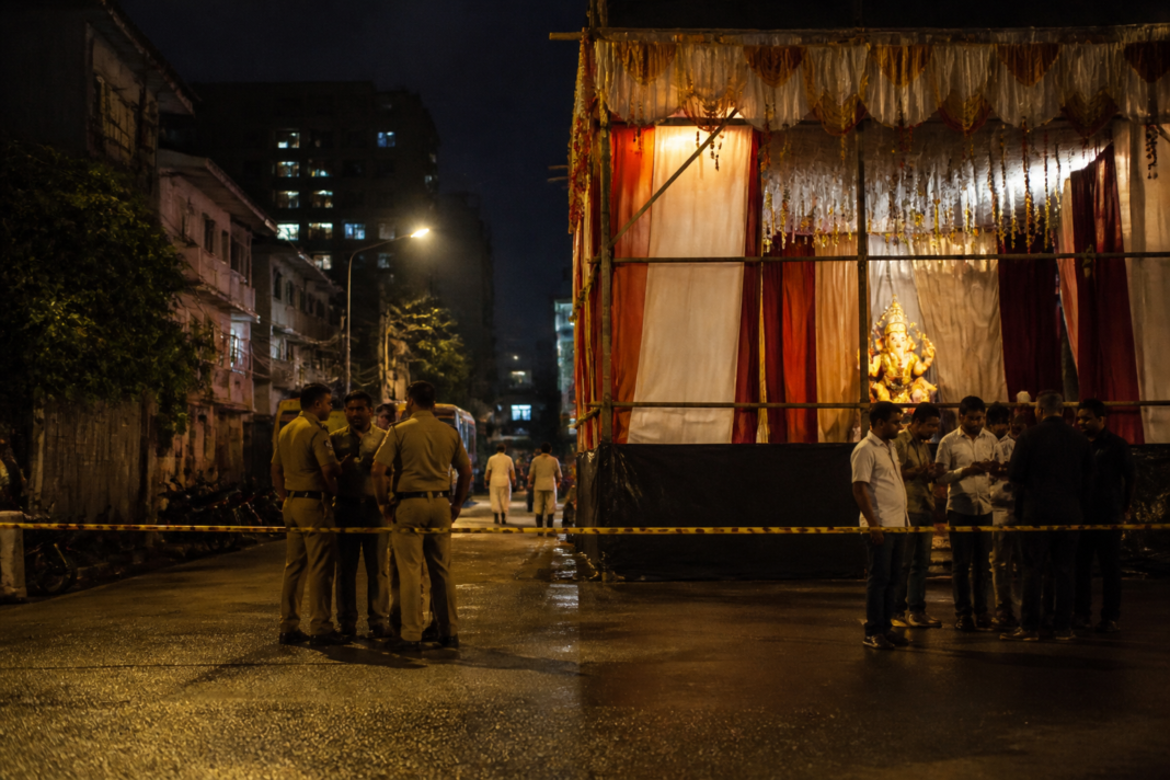 Police personnel investigating the reported Kondhwa firing near a Ganpati mandal in Pune
