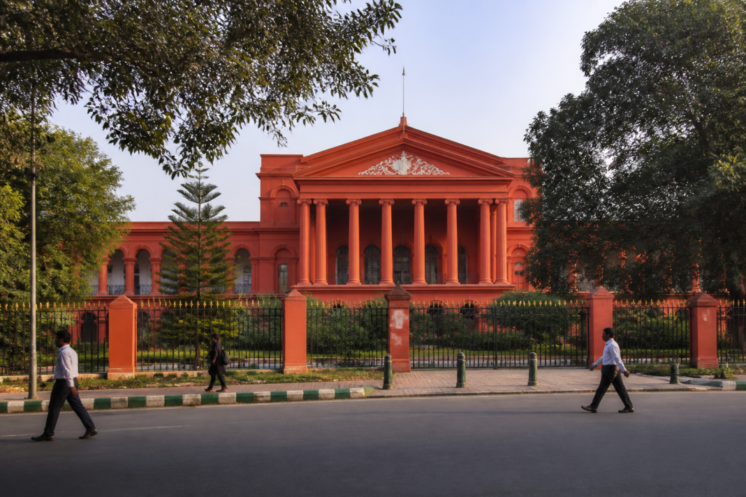 Karnataka High Court building representing the Kharge family land case and Bengaluru land allotment dispute