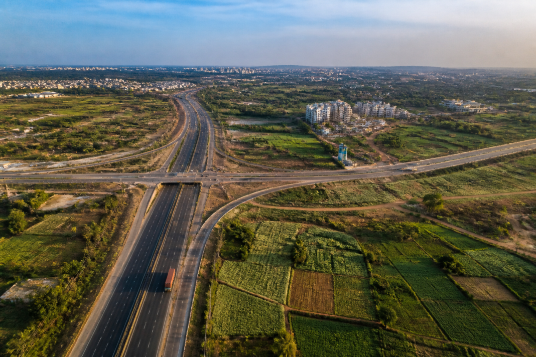 Proposed Bengaluru PRR-2 corridor landscape near the city’s southern outskirts, showing peripheral roads and developing land