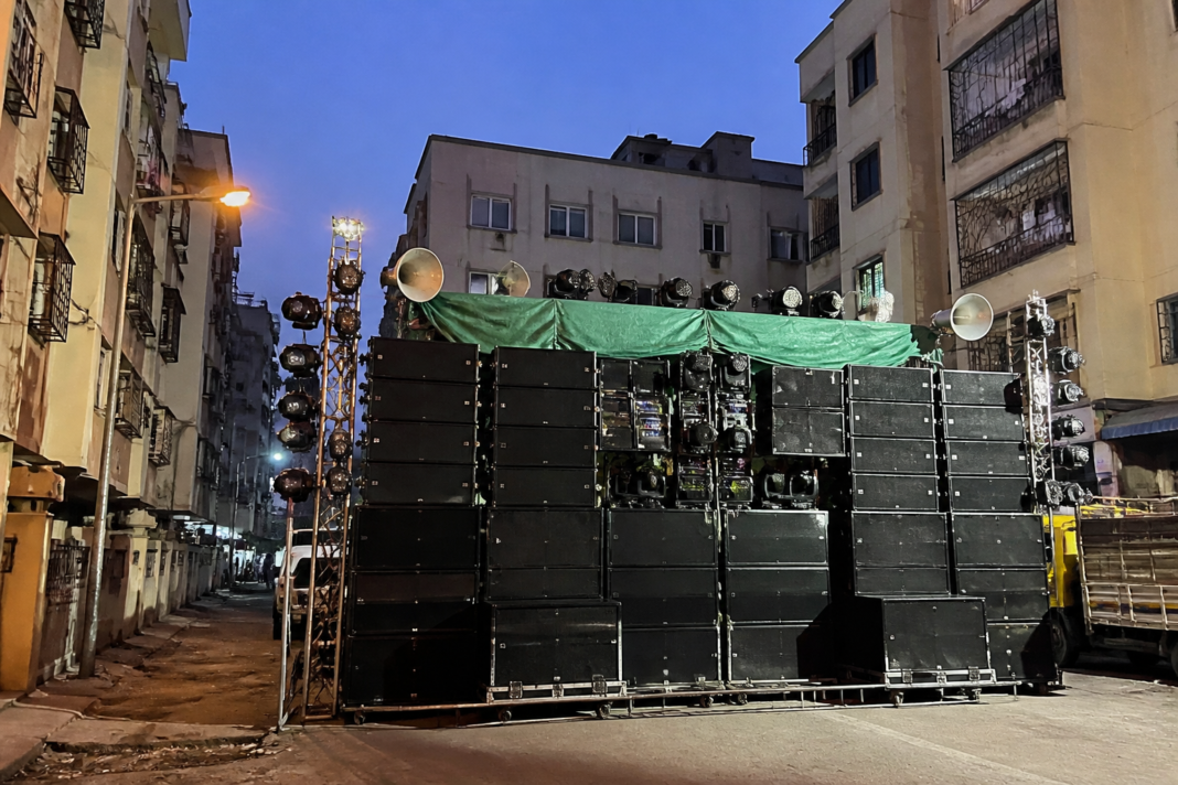 Festival loudspeakers and DJ sound equipment set up near homes in Vasai, illustrating concerns over Vasai sound pollution