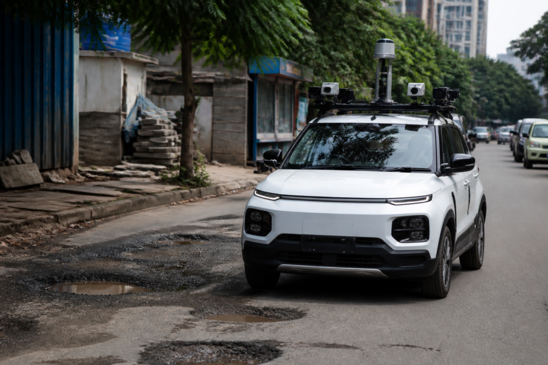 AI-enabled municipal survey vehicle scanning a Bengaluru road for potholes and civic infrastructure problems