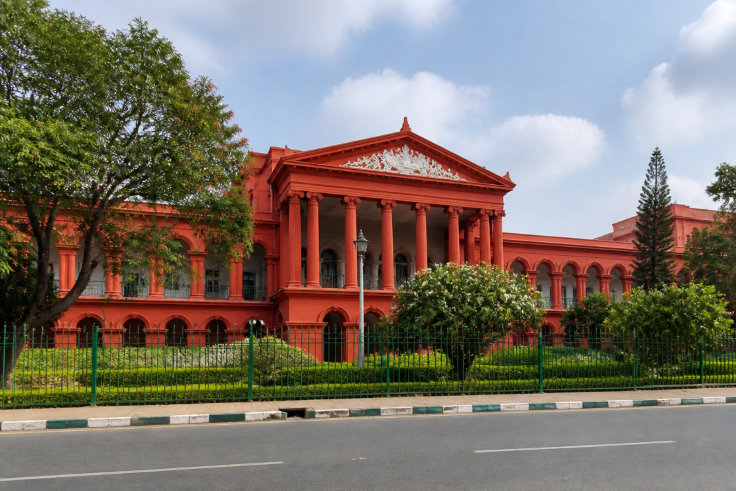 Karnataka High Court building representing an SIT investigation into an accident compensation case