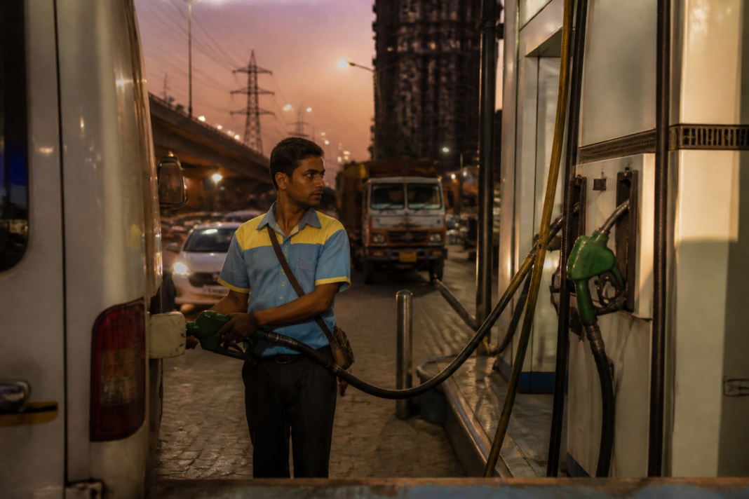 Fuel pumps at an Indian petrol station representing pressure from rising crude oil prices in India