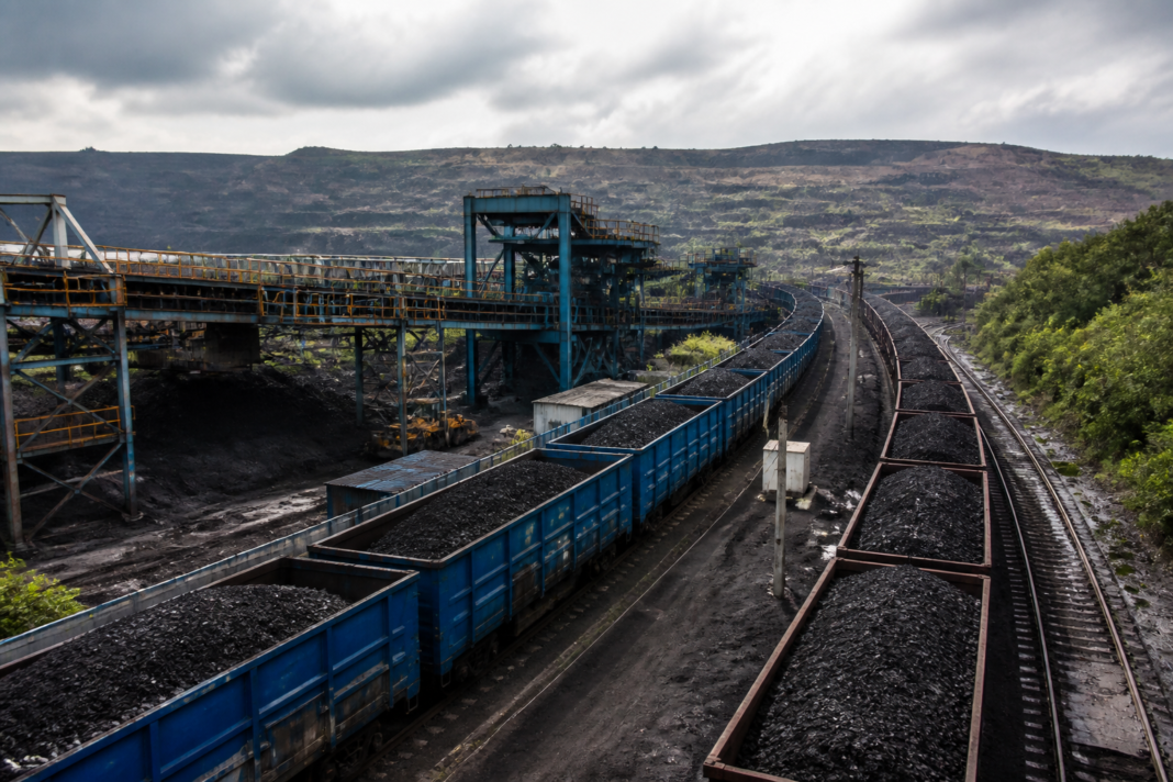 Coal handling and railway loading operations at a Northern Coalfields mining site