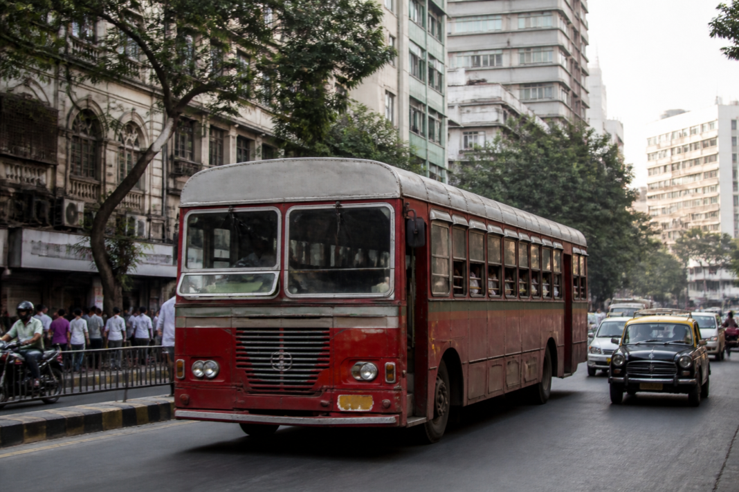 BEST bus operating on a Mumbai street amid the city’s urban traffic