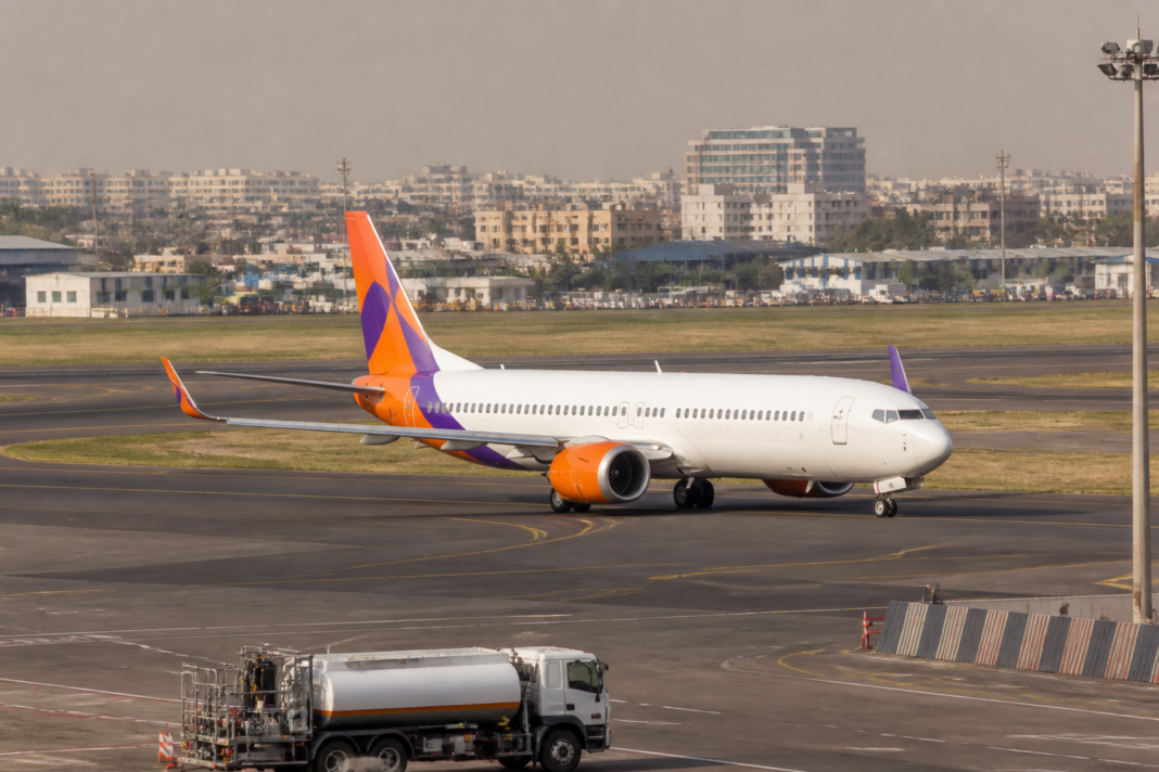 Akasa Air Boeing 737 MAX aircraft at an airport for a Mumbai-Goa flight using sustainable aviation fuel