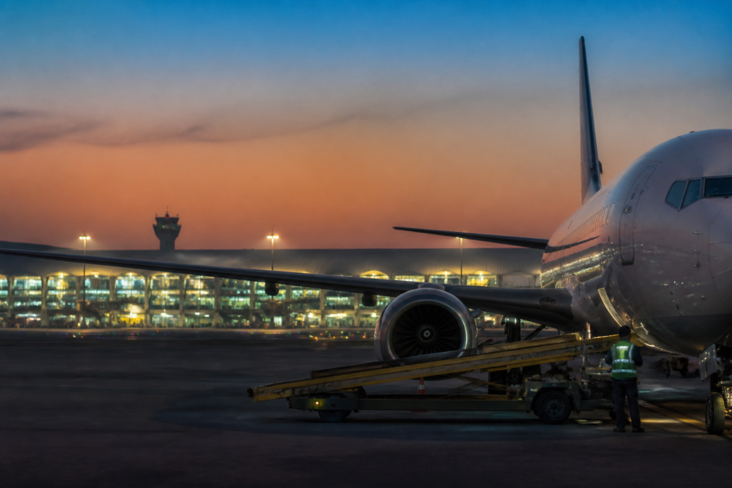 Passenger aircraft on the Mumbai Dar es Salaam route at an airport terminal