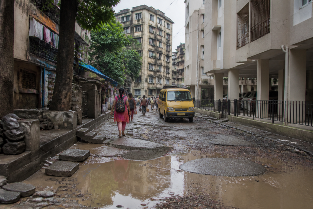 Damaged road and potholes in Gaikwad Wadi, Dombivli West, highlighted in residents' complaints about Dombivli road conditions