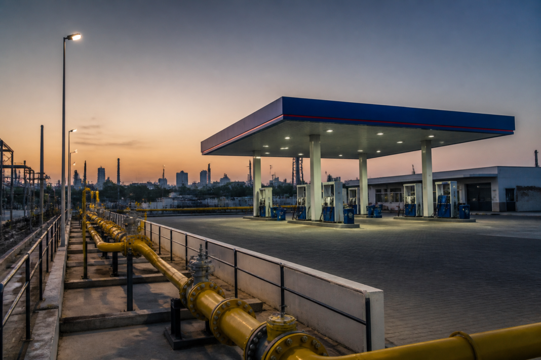 Fuel station and urban gas infrastructure representing the impact of crude oil above $100 on India’s energy companies