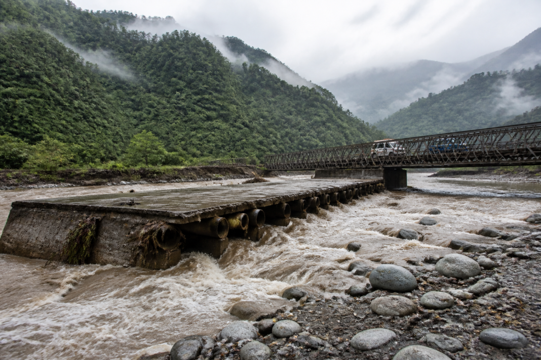 Balason causeway damaged by swollen river water near Dudhia in Mirik