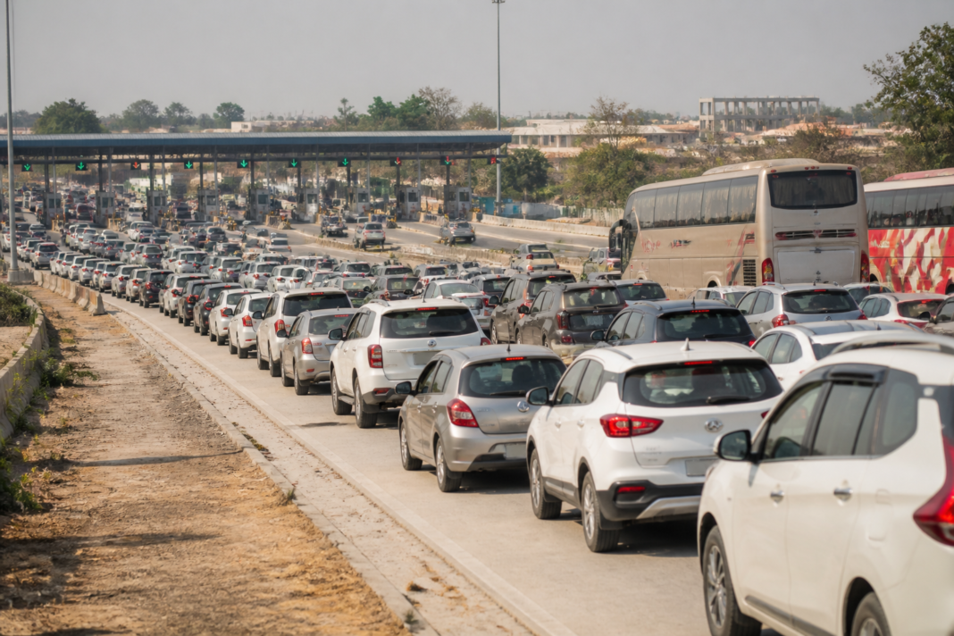 Bengaluru-Mysuru Highway traffic queued at a toll plaza during a festival weekend