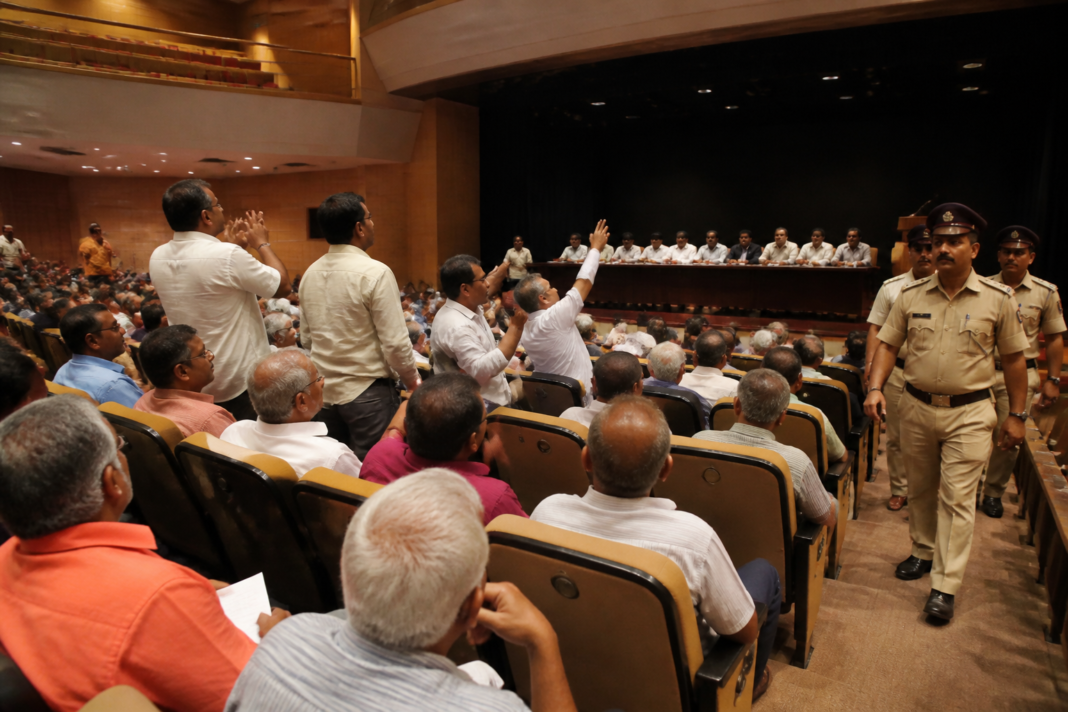 TDCC Bank AGM in Thane where members argued during a tense cooperative bank meeting
