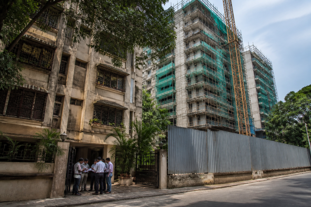 Mumbai ITAT redevelopment tax ruling involving a cooperative housing society and a redevelopment agreement