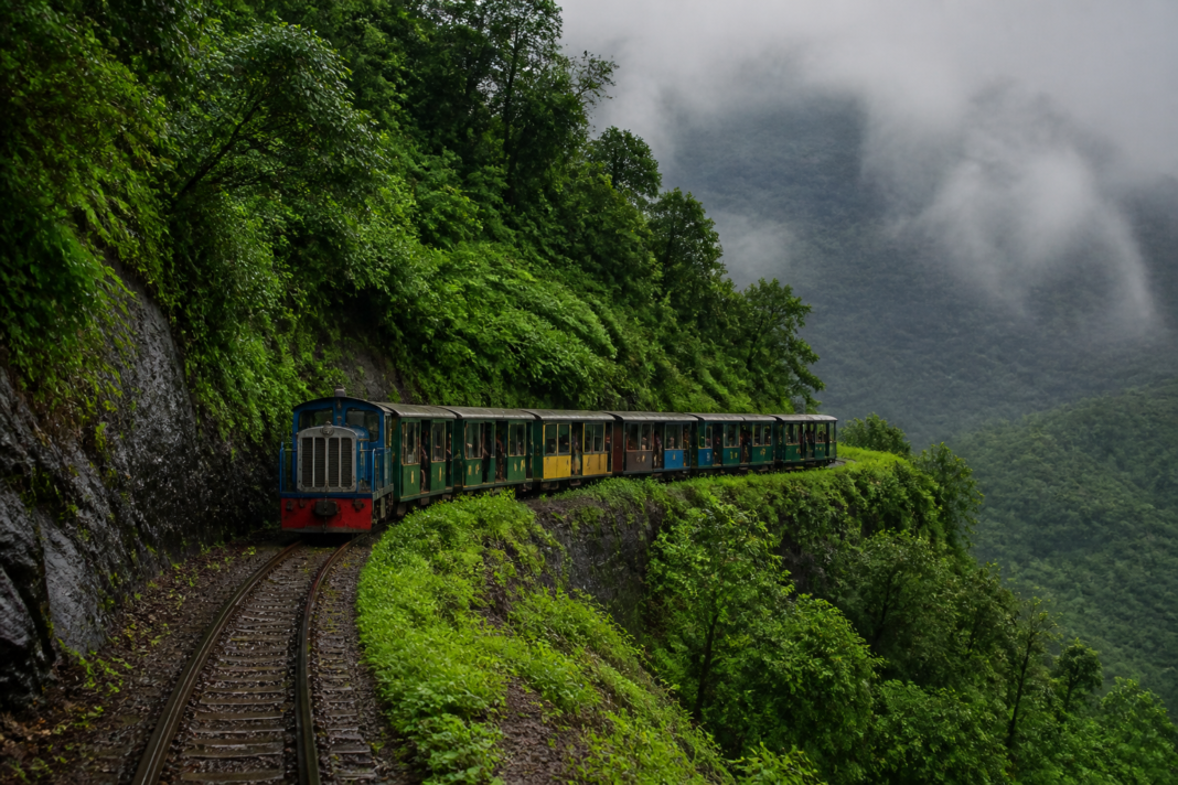 Neral-Matheran railway toy train winding through the Sahyadri hills during monsoon