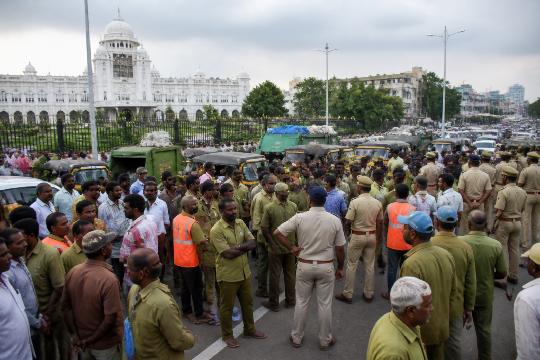 Sanitation workers protesting GHMC garbage collection privatisation near Hyderabad Assembly