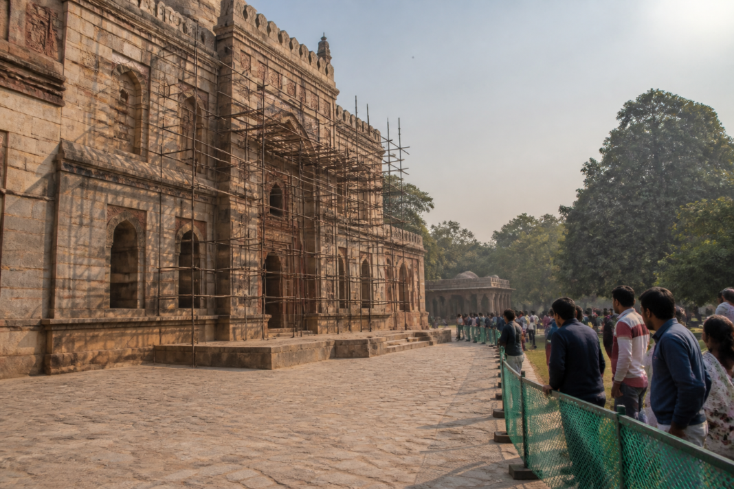 Delhi monument repairs underway at a historic heritage complex with restricted visitor access